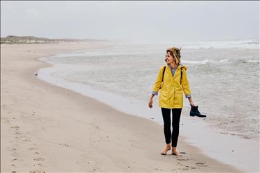 woman on the beach enjoying her sabbatical