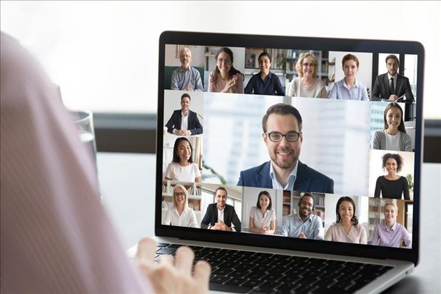 remote worker on a video chat with her team