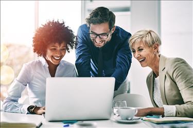 happy employees working together in a conference room