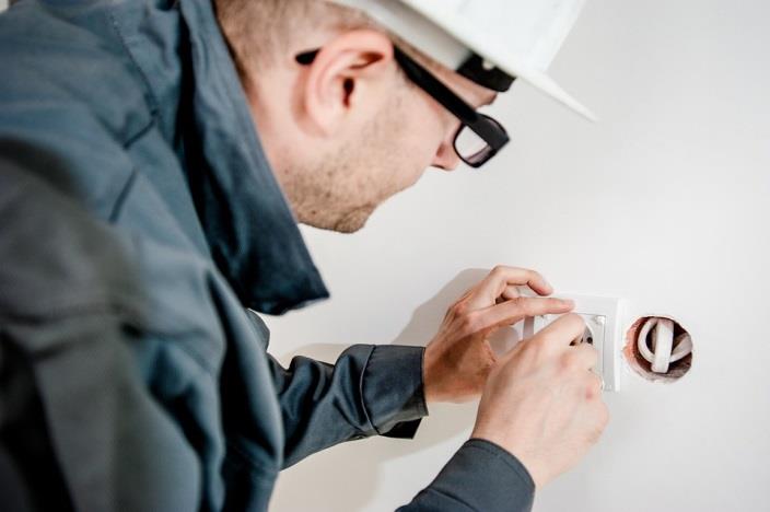 Electrician installing wiring in a home