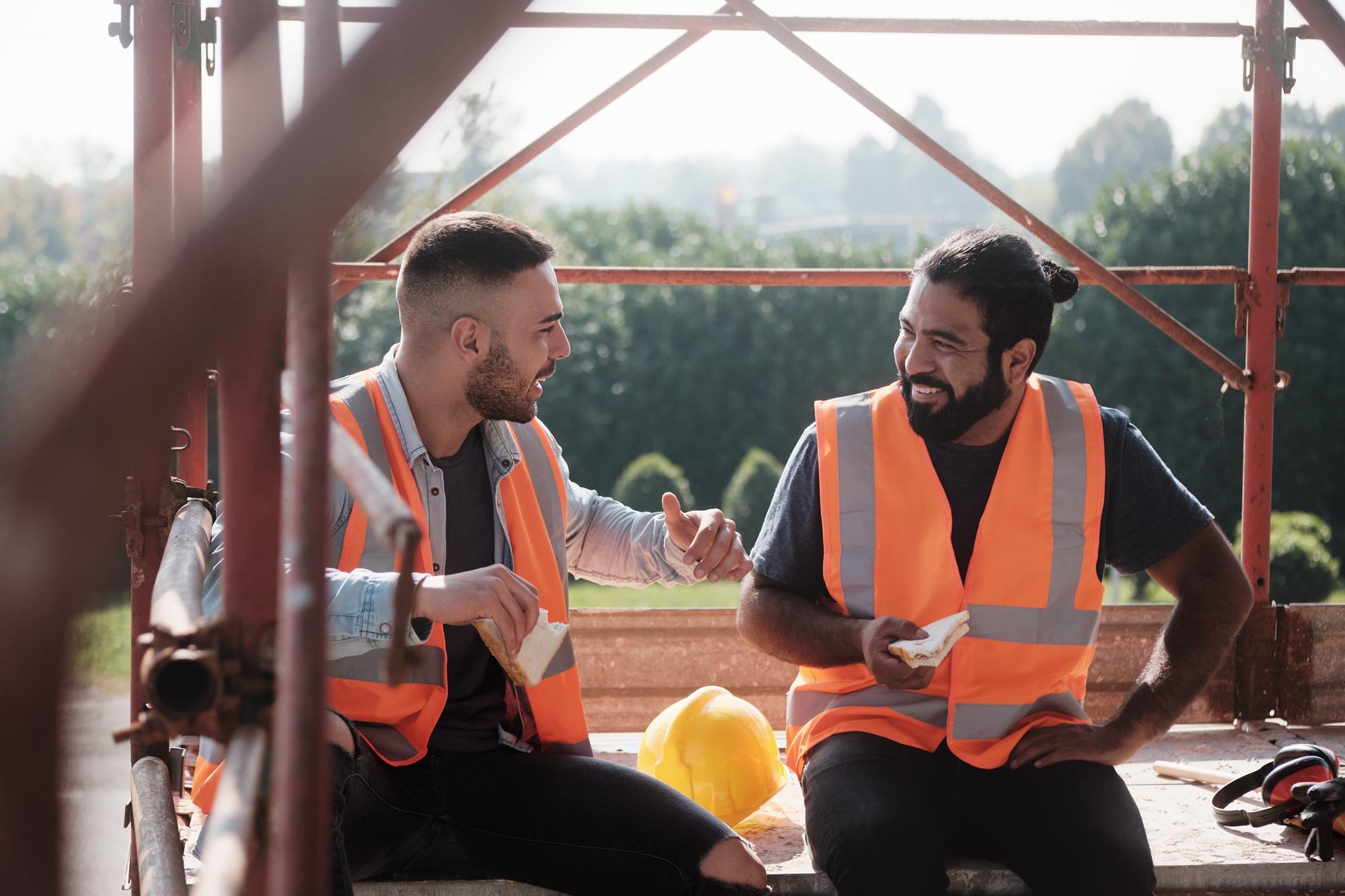 happy construction workers on their lunch break