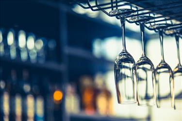 Empty glasses hanging in a restaurant