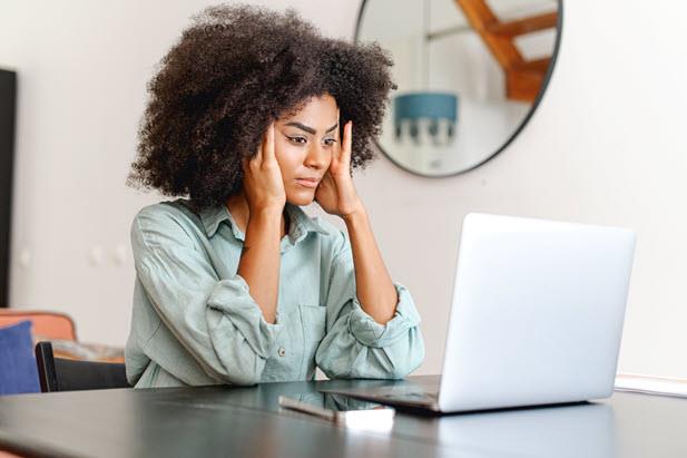 woman stressed at computer
