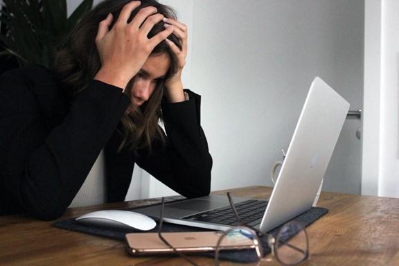 Stressed out woman at work